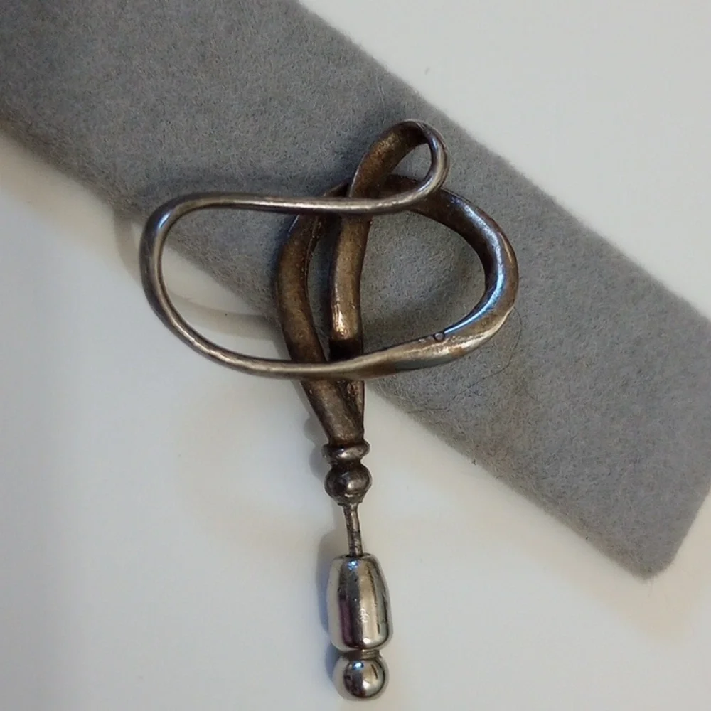 Vintage calla lily flower pin marked MoMA and sterling